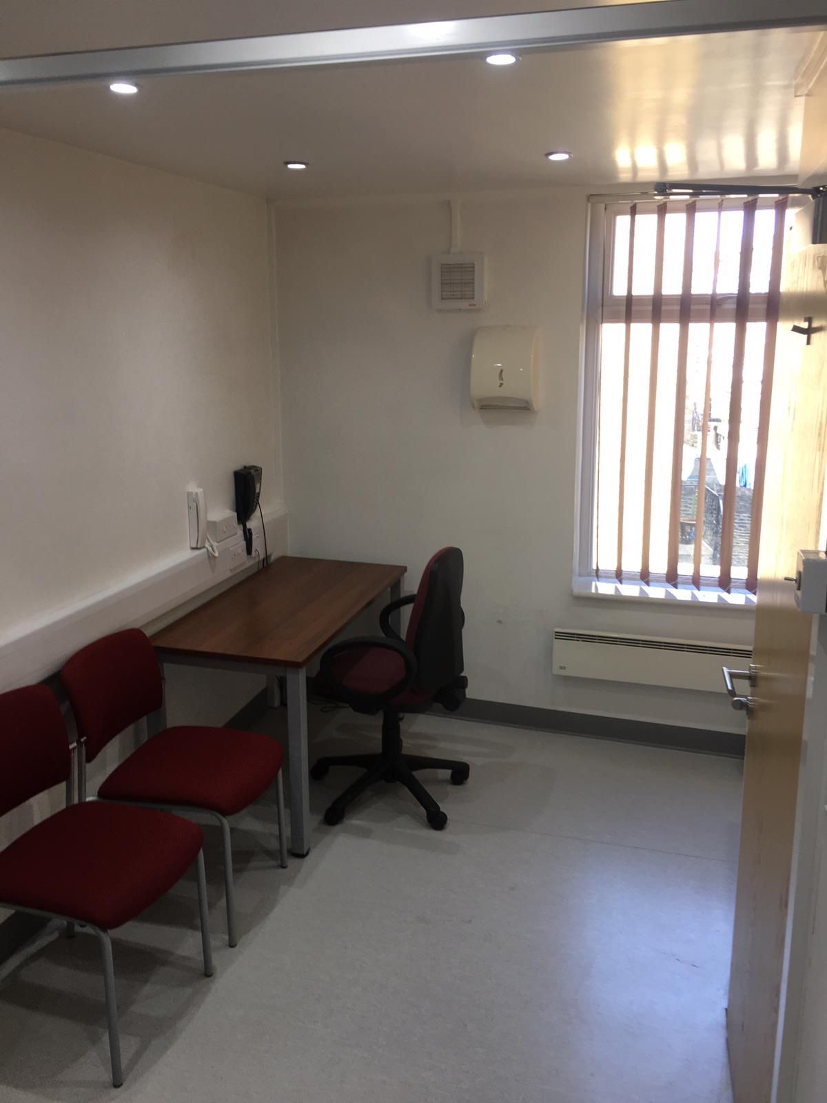 Consulting Room 3 with desk and large window